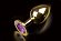 Большая золотая анальная пробка с закругленным кончиком и фиолетовым кристаллом - 9 см.